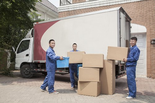 Man with van loading furniture in Hornsey street