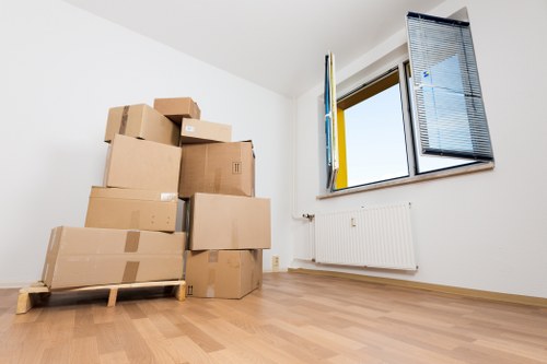 Furniture dismantling and setup during an office move in Hornsey