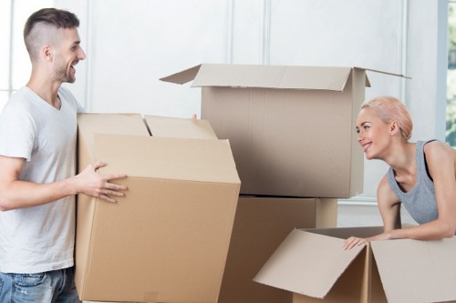 Team member investigating service details for a moving complaint