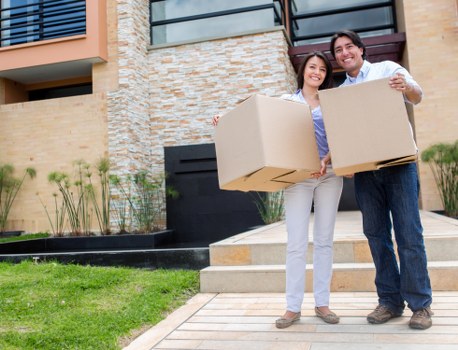 Professional man and van service loading furniture